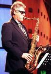 Clinton using saxophone to create pro-Belgian cerebrosonic mind control